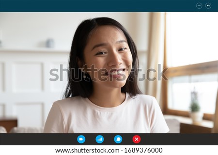 Headshot portrait screen application view of happy millennial Asian girl talk on video call online, smiling young ethnic woman speak have pleasant Webcam chat on laptop, quarantine alone at home