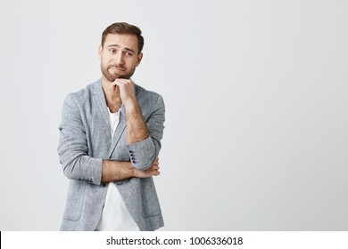 Hand-under-chin Pose Stock Images, Royalty-Free Images & Vectors