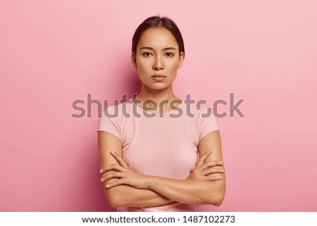 Similar – Image, Stock Photo Girl with a serious look and wet hair.