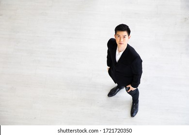 Headshot Of Successful Smiling Young Asian Businessman Executive Stylish. Close Up Face Of Happy Successful Business Man.