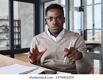 Headshot Webcam View Of Adult Black African American Business Man Coach Speaker Wearing Headset Talking To Audience Having Teaching Virtual Video Course. Job Virtual Interview With Executive Manager.