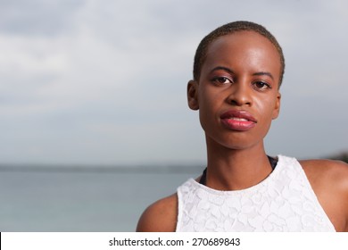 Headshot Of A Young Black Woman With Short Hair