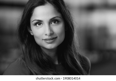 Headshots Of Beautiful Asian Indian Woman In An Office Setting.