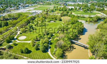 Headwaters Park aerial in summer with rows of trees MLK bridge over St. Marys River Fort Wayne