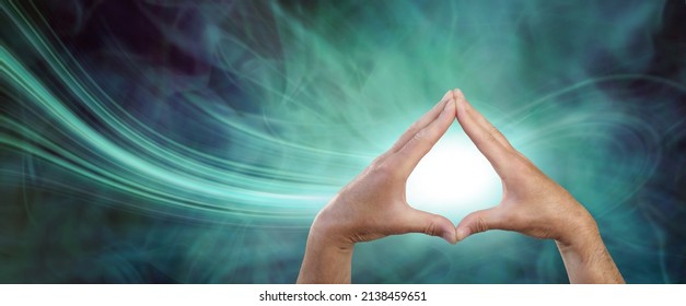 Healer Attracting Scalar Energy With Palm Chakras - Male Hands Touching Fingertips Together With A White Orb Between Against A Green Navy Blue Energy Field And A Stream Of Energy Flowing In
