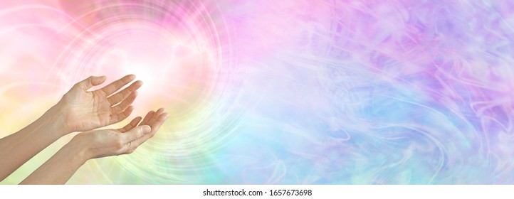 Healer Working With Colour Healing Full Spectrum Energy  - Female Cupped Hands Sensing  Rainbow Coloured Vortex With  Copy Space 
