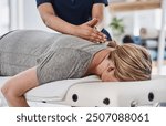 Healing, hands and physiotherapist with person, spine and massage for pain of patient, healthcare and injury. Wellness, chiropractor and help for relief of tension, expert and physiotherapy in clinic