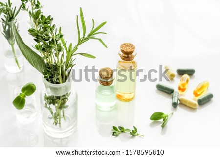 Similar – Image, Stock Photo Green cosmetics bottle with flowers and spa accessories