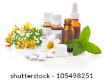 Healing herbs and medicinal bottles. Alternative medicine concept