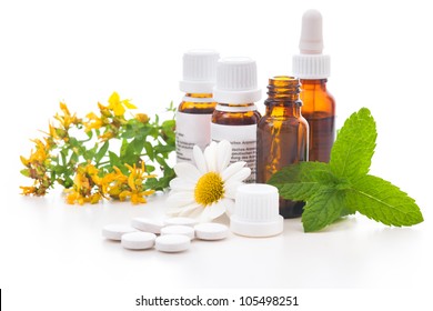 Healing herbs and medicinal bottles. Alternative medicine concept