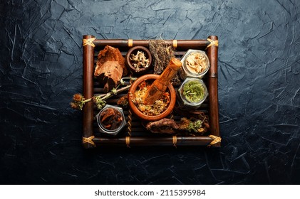 Healing Herbs And Plants. Set Of Homeopathic Herbs In A Wooden Tray.