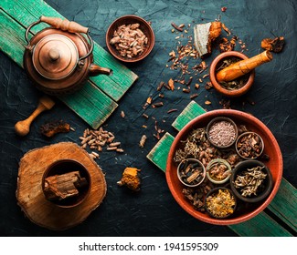 Healing tea or infusion of medicinal herbs.Healing plants in herbal medicine.Flat lay