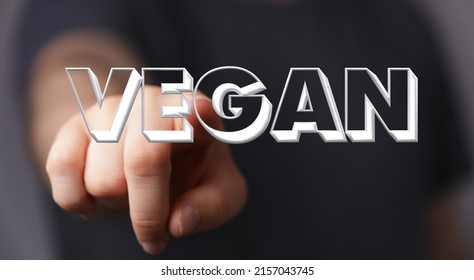 A Health Advocate Tapping On Hologram Of The Word VEGAN  Healthy Living Concept