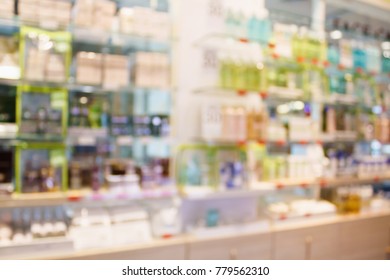 Health And Beauty Product Shelves In Cosmetic Shop Store Abstract Defocused Blur Background