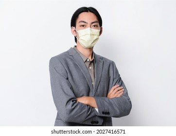 Health, Business Concepts., Portrait young businessman in gray suit with d shirt wearing face mask with arms crossed, - Shutterstock ID 2027416571