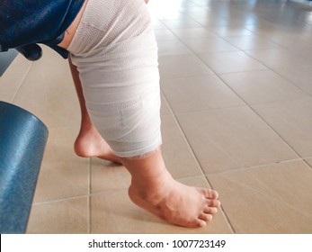 Health Care Background Man Accident Leg With Bandage. Image For Hospital, Healthy, Danger, Person, Injury, First Aid Concept