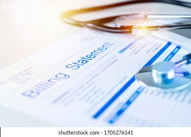 Health care billing statement with stethoscope, bottle of medicine for doctor's work in medical center stone background. - Shutterstock ID 1705276141