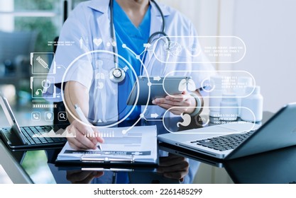 health care business graph data and growth, Medical examination and doctor analyzing medical report network connection on tablet screen. in hospital - Shutterstock ID 2261485299