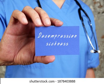 Health Care Concept Meaning Decompression Sickness With Sign On The Sheet.
