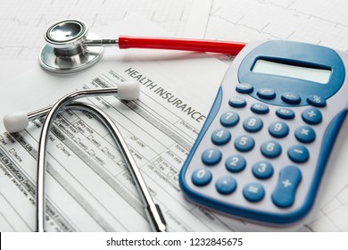 Health care costs. Stethoscope and calculator symbol for health care costs or medical insurance
