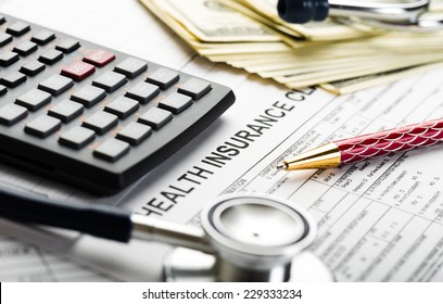 Health Care Costs. Stethoscope And Calculator Symbol For Health Care Costs Or Medical Insurance 