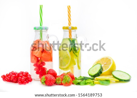 Similar – Infused water in bottles with drink straw and ingredients on white background, front view. Water Flavored with fruits, berries and herbs. Summer drinks. Healthy and clean detox beverages.