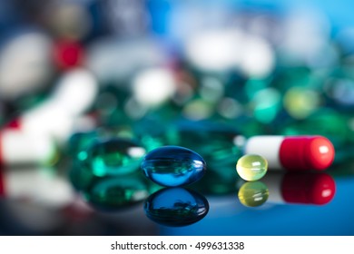 Health Care, Medical Theme And Concept. Painkillers, Pills, Microscope, Drug Development.