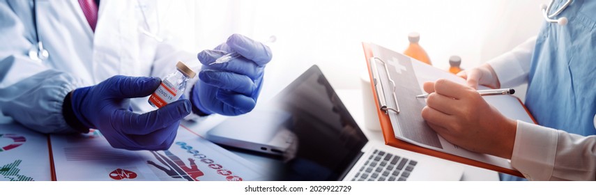 Health Care Researchers Working In Life Science Laboratory And Analyzing Microscope Slides In Research Lab. New Epidemic Corona Virus. Corona Virus Outbreaking.