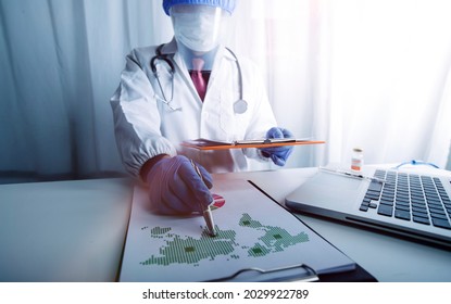 Health Care Researchers Working In Life Science Laboratory And Analyzing Microscope Slides In Research Lab. New Epidemic Corona Virus. Corona Virus Outbreaking.