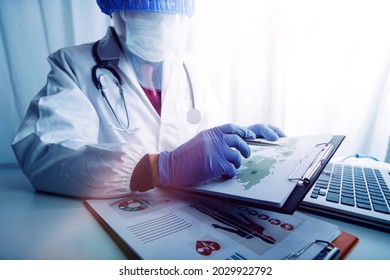 Health Care Researchers Working In Life Science Laboratory And Analyzing Microscope Slides In Research Lab. New Epidemic Corona Virus. Corona Virus Outbreaking.