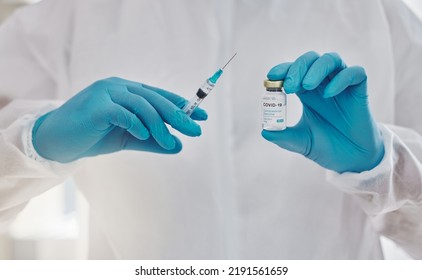 Health Care, Science And Innovation By A Doctor Holding A Vaccine For Corona Or Injection For Virus With Copy Space. Medical Discovery By A Researcher Leading A Drug Trial On A Treatment For Covid