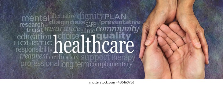 Health Care Worker - Female Hands Gently Cradling Male Hands On A Rustic Dark Stone Background With A Health Care Word Cloud To The Left