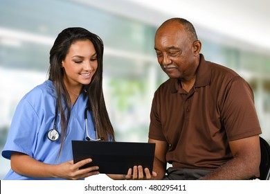 Health Care Worker Helping An Elderly Patient