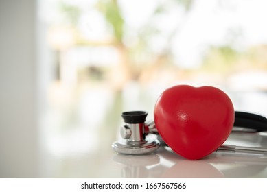 Health Checkup Heart And Cardiovascular. Heart With Stethoscope At Hospital.