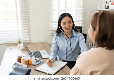 Health Checkup and Patient Assessment. A nurse using a stethoscope to examine a patient during a routine checkup.