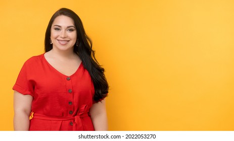 Health Coaching. Plus Size Woman. Body Positive. Advertising Background. Beautiful Happy Fatty Lady Stylish Red Dress Posing Isolated Yellow Copy Space.