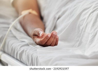 Health, disease and insurance with sick man receiving emergency medicare at hospital. Chronic illness with an IV drip in his arm. Patient in critical condition, on life support for organ donation - Shutterstock ID 2192921597