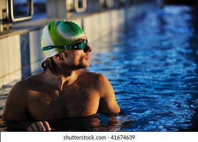 Health And Fitness Lifestyle Concept With Young Athlete Swimmer Recreating  On Olimpic Pool