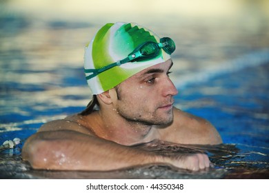 Health And Fitness Lifestyle Concept With Young Athlete Swimmer Recreating  On Olimpic Pool