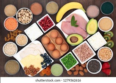 Health Food For Body Builders With High Protein Lean Meat, Dairy, Dietary Supplement Powders, Pulses, Seeds, Nuts, Grains, Cereals, Fruit And Vegetables.