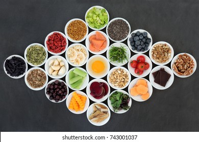 Health Food Concept To Boost Brain Power And Promote Memory In Porcelain Bowls On Slate Background. Foods High In Antioxidants, Anthocyanins, Vitamins And Minerals.