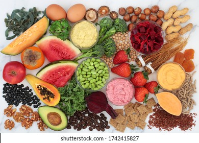 Health Food For Energy, Vitality & Fitness With Fruit, Vegetables, Dips, Nuts, Dairy, Pasta, Legumes, Cereals & Herbal Medicine. High In Vitamins, Minerals, Antioxidants, Protein & Omega 3.  Flat Lay 