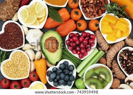 Health food for fitness conceptwith immune boosting properties with fruit, vegetables, herbs, spice, grains, pulses. High in anthocyanins, antioxidants, smart carbs, omega 3, minerals, vitamins.