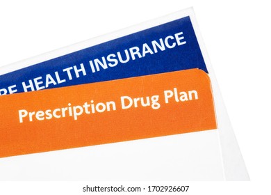 Health Insurance Card With A Prescription Drug Plan Membership Card Isolated On White