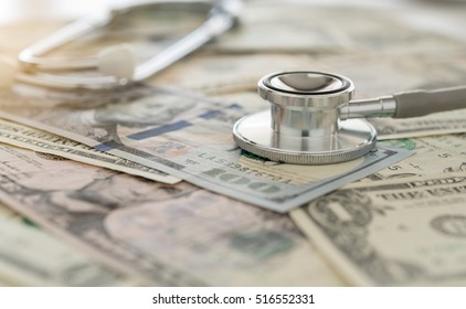 Health Insurance Claim, Stethoscope On Dollar Banknote Money. Concept Of Health Care Costs, Finance, Health Insurance Funds.