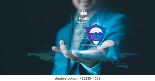 Health insurance concept. businessman holding virtual graphic insurance form and healthcare medical icon, access to welfare health, medical health and life, accident and logistics insurance - Powered by Shutterstock