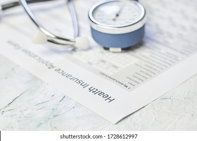 Health Insurance Industry. Individual Medical Health Insurance Policy And Stethoscope