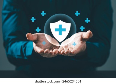 Health insurance and medical welfare concept. Hand with plus sign and medical icons, health and access to healthcare Get people interested in health care - Powered by Shutterstock