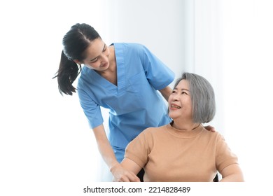 health insurance of retired assistance concept, woman nurse or doctor help support senior patient at home, medicine caregiver having medical health care for elderly female to happy care at home - Powered by Shutterstock