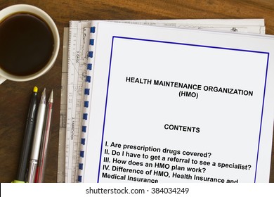 Health Maintenance Organization With Coffee And Documents.